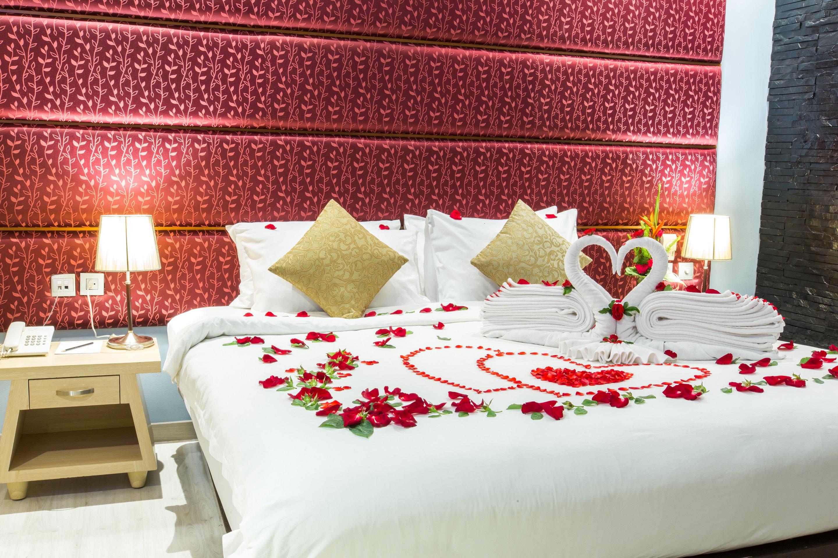 Indochine Resort And Villas - Sha Extra Plus Patong Exteriör bild A bed decorated with rose petals