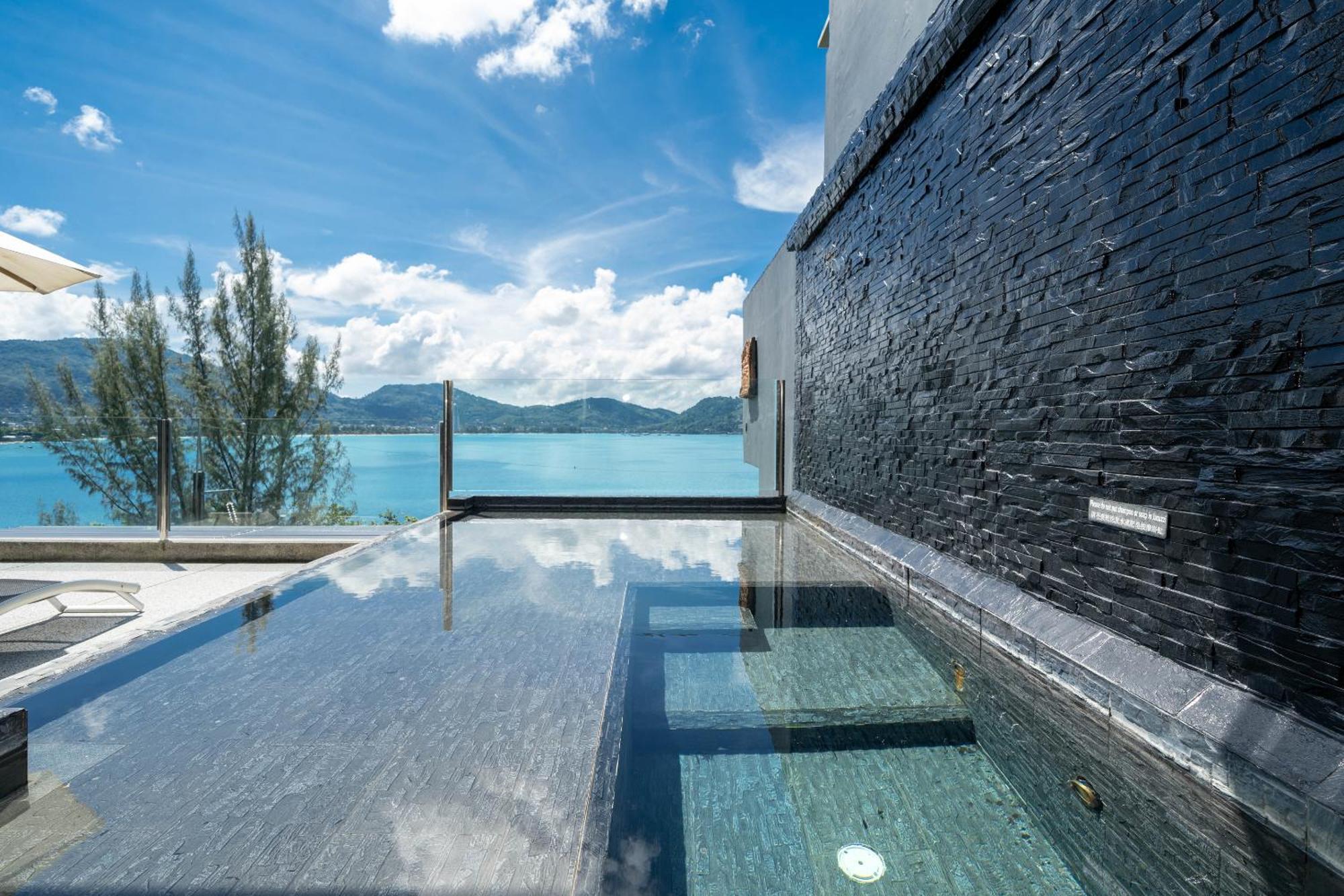 Indochine Resort And Villas - Sha Extra Plus Patong Exteriör bild The swimming pool at the hotel